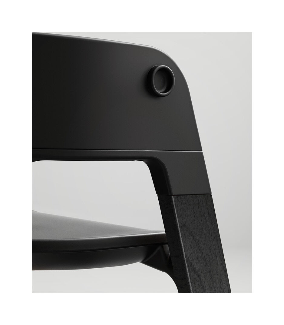 Stokke® Steps™ Highchair. Beech Black and Black seat. Detail.